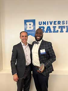 Adam Shareef receiving 2023 Judge Robert Bell Award